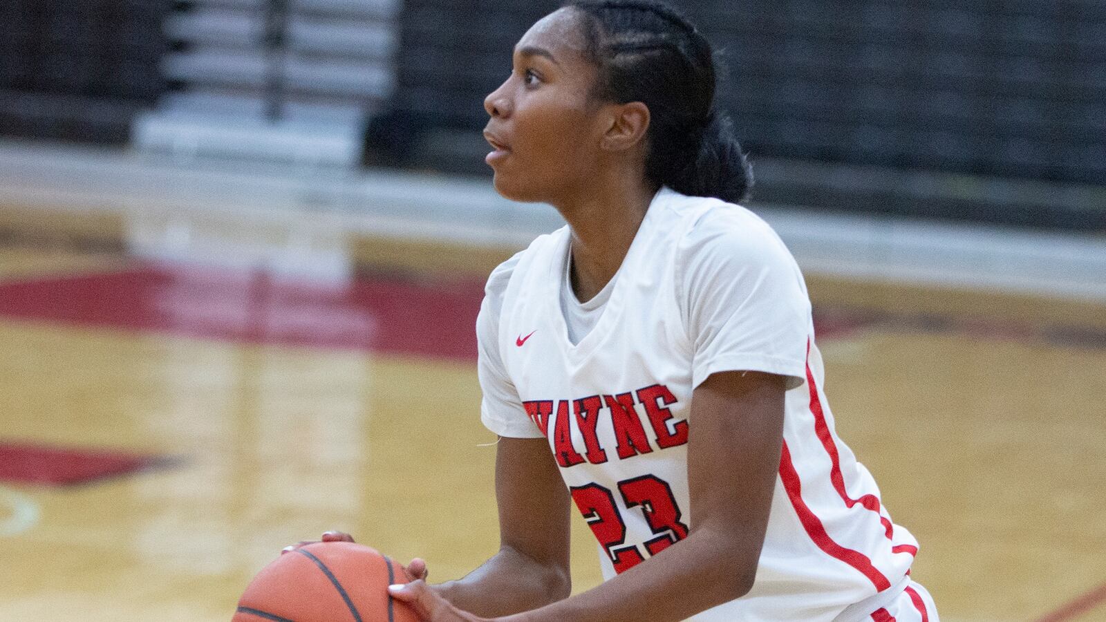 Wayne senior Bree Hall sets up for a shot during the first half of the Warriors' 66-64 loss at home to Centerville on Thursday night. Hall scored a game-high 29 points. Jeff Gilbert/CONTRIBUTED