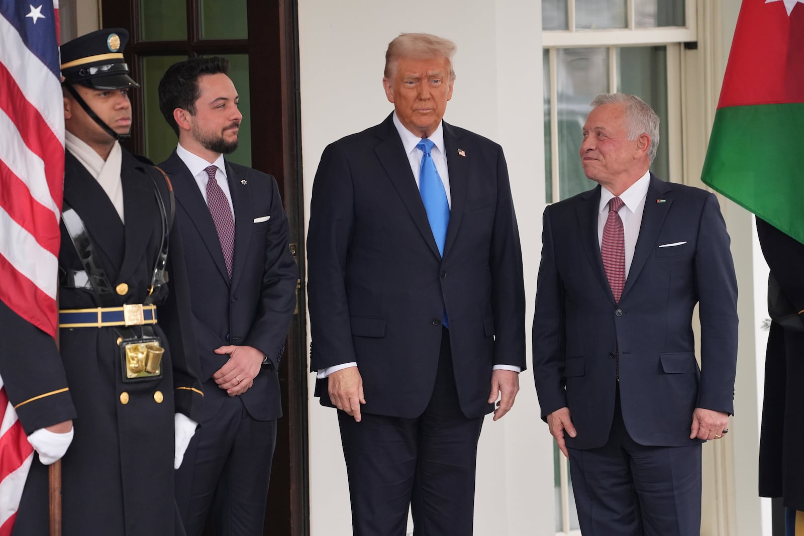 President Donald Trump greets Jordan's King Abdullah II at the White House, Tuesday, Feb. 11, 2025, in Washington. (AP Photo/Evan Vucci)