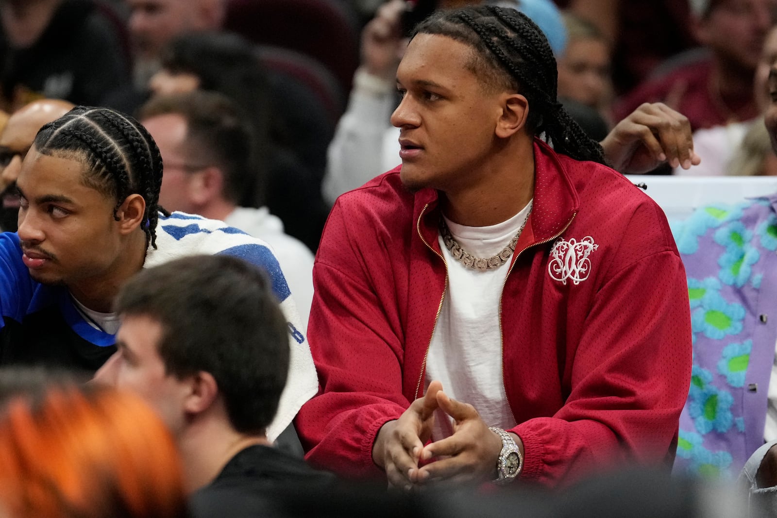 Injured Orlando Magic forward Paolo Banchero watches from the bench in the first half of an NBA basketball game against the Cleveland Cavaliers, Friday, Nov. 1, 2024, in Cleveland. (AP PhotoSue Ogrocki)