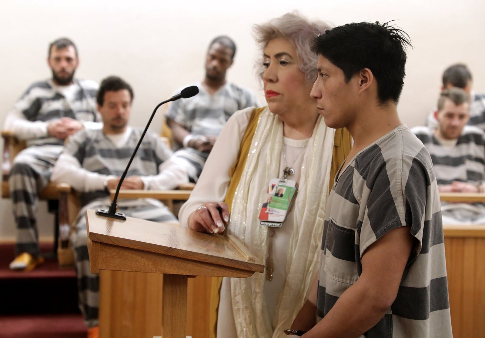 Ricardo Perez is arraigned in Clark County Municipal Court with the help of an interpreter Thursday. BILL LACKEY/STAFF