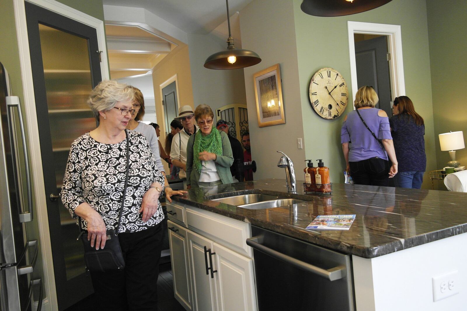 Visitors tour one of the properties on the 2018 Downtown Dayton Partnership held its annual housing tour. PHOTO COURTESY OF DDP