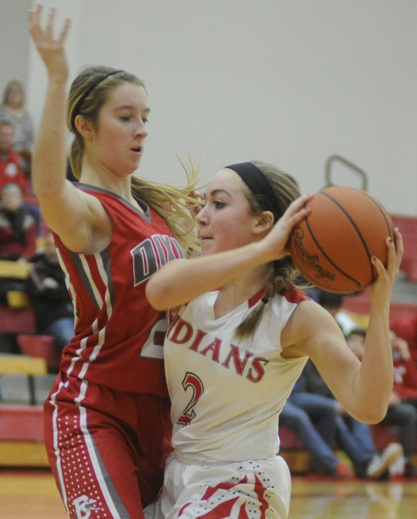 Newton’s Tatum McBride (with ball) is checked by Dixie’s Katie Honeywell. Newton defeated visiting Dixie 41-36 in a girls high school basketball game on Monday, Feb. 9, 2015. MARC PENDLETON / STAFF