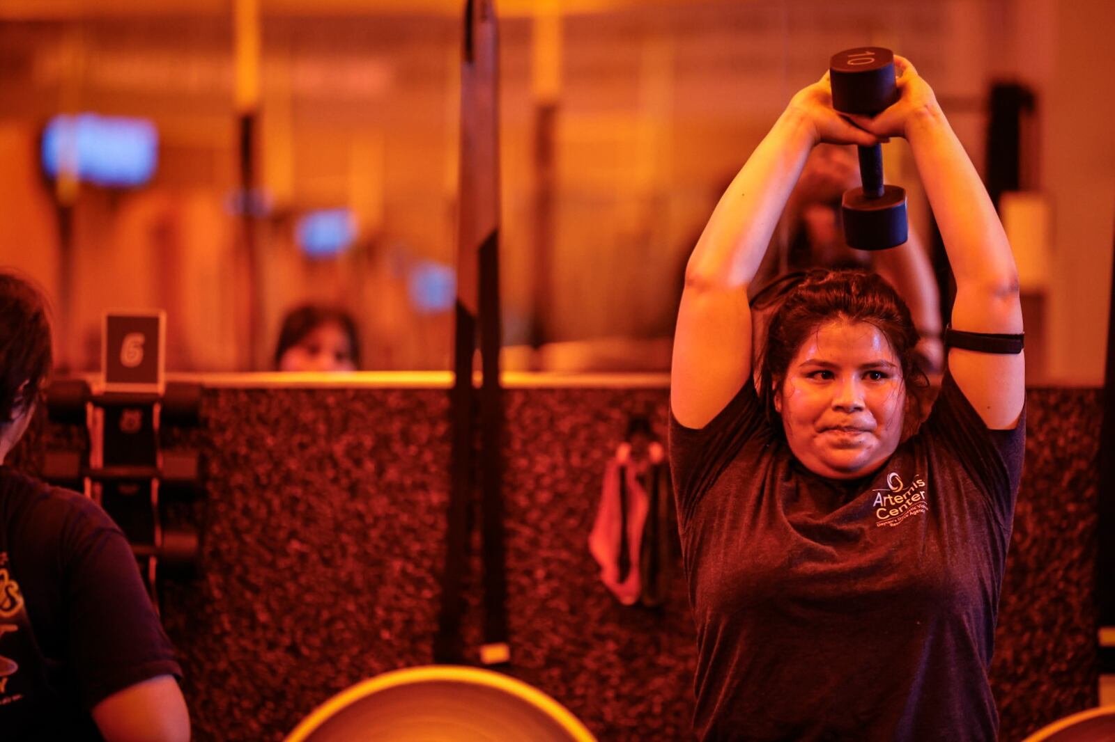 Yelliani Flores works out at Orangetheory Fitness on North Fairfield Road in Beavercreek. JIM NOELKER/STAFF