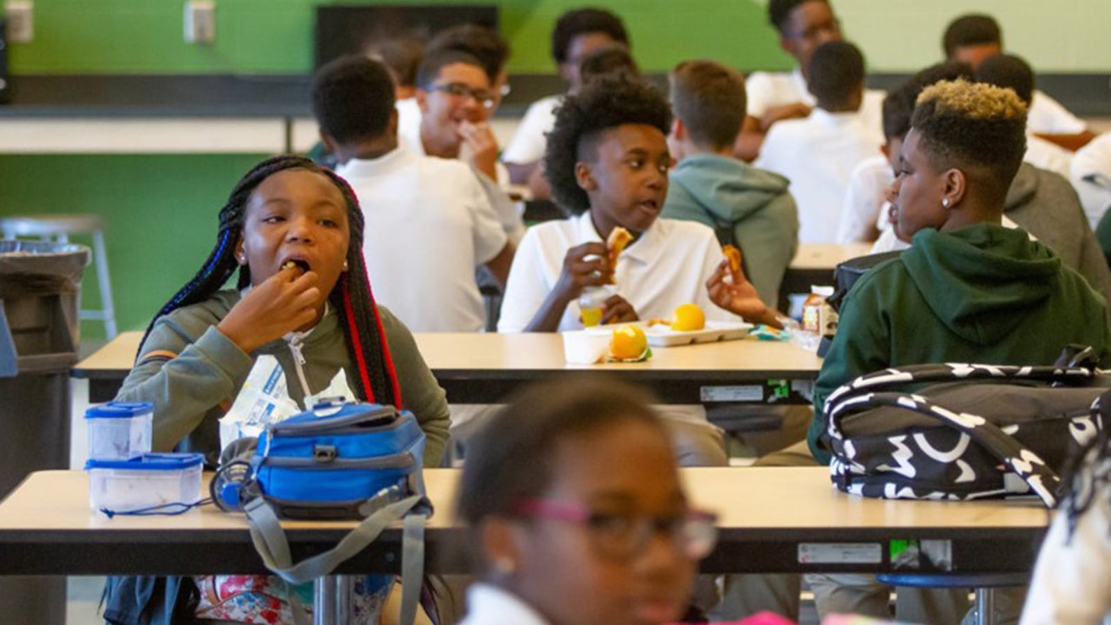 Students at Drew Charter School eat lunch Friday, Aug. 9, 2019.