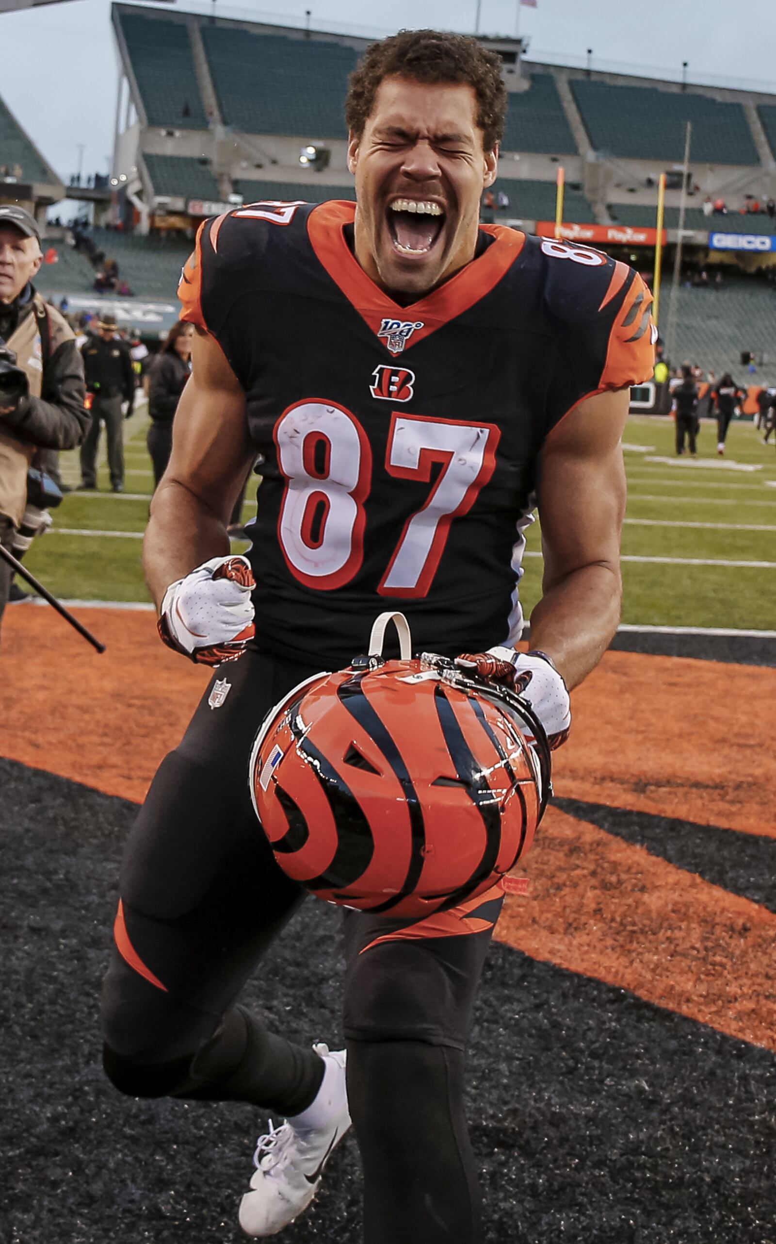 CINCINNATI, OH - DECEMBER 01: C.J. Uzomah #87 of the Cincinnati Bengals celebrates after picking their first win of the season against the New York Jet at Paul Brown Stadium on December 1, 2019 in Cincinnati, Ohio. (Photo by Michael Hickey/Getty Images)