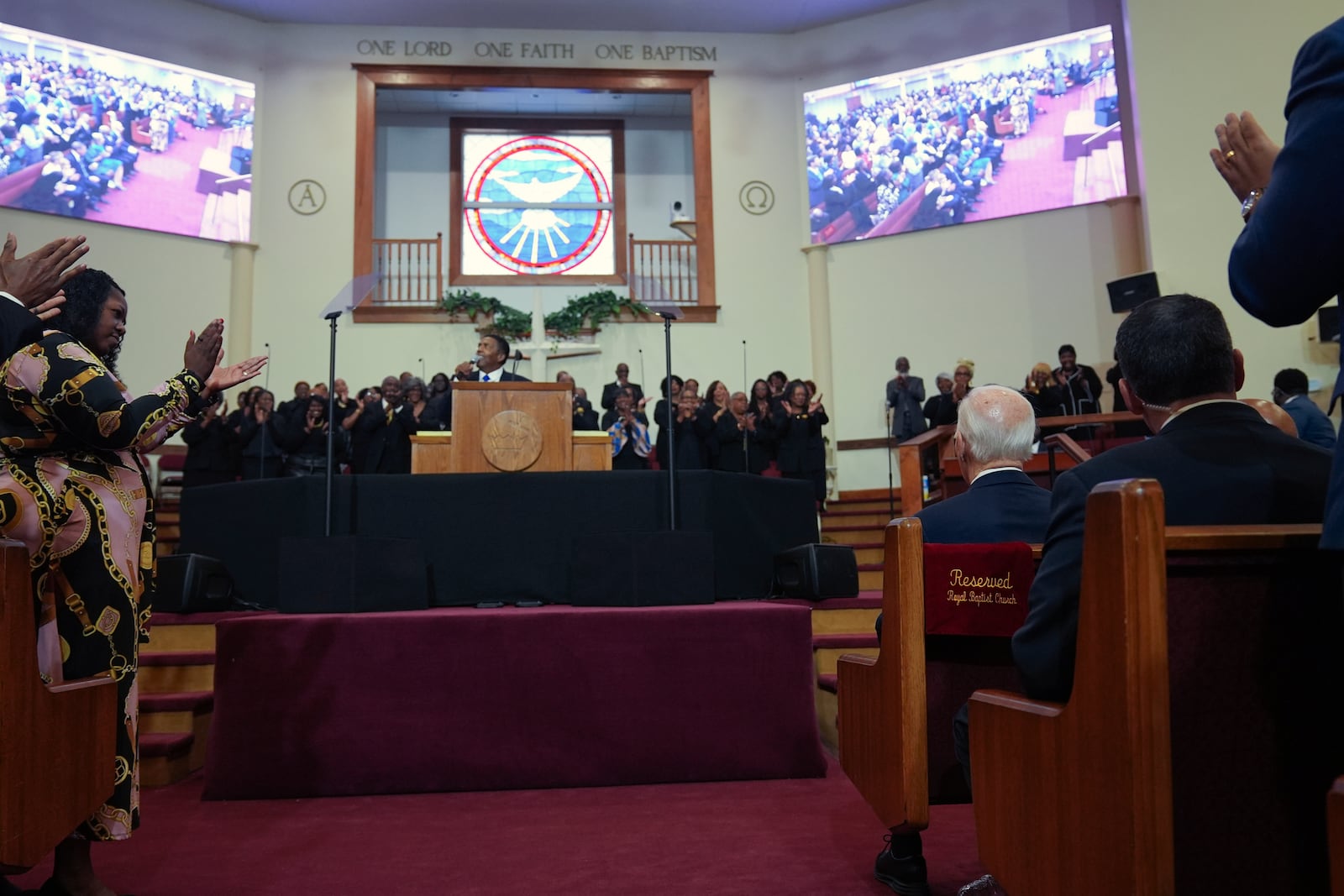 President Joe Biden, seated right, attends a church service at Royal Missionary Baptist Church in North Charleston, S.C., Sunday, Jan. 19, 2025. (AP Photo/Stephanie Scarbrough)