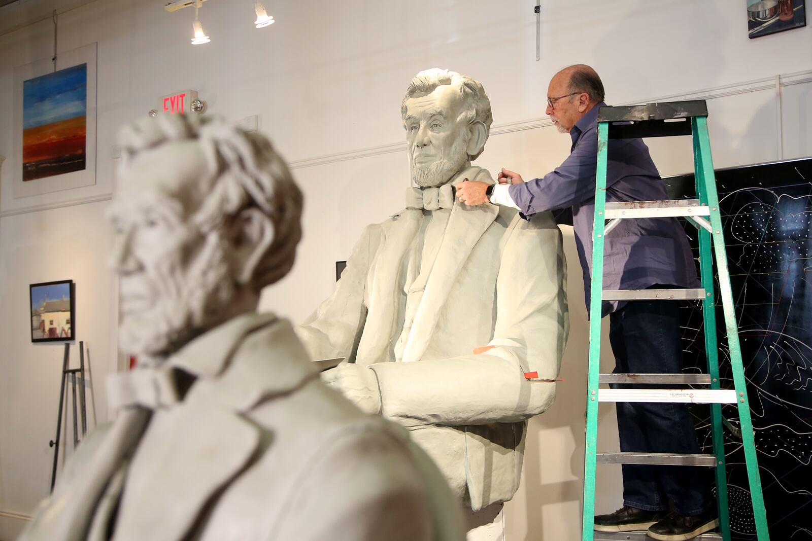 Ohio artist Mike Major has spent months shaping the likeness of Abraham Lincoln, the 16th president of the United States, from plasteline clay and Styrofoam in his Urbana studio.   LISA POWELL / STAFF