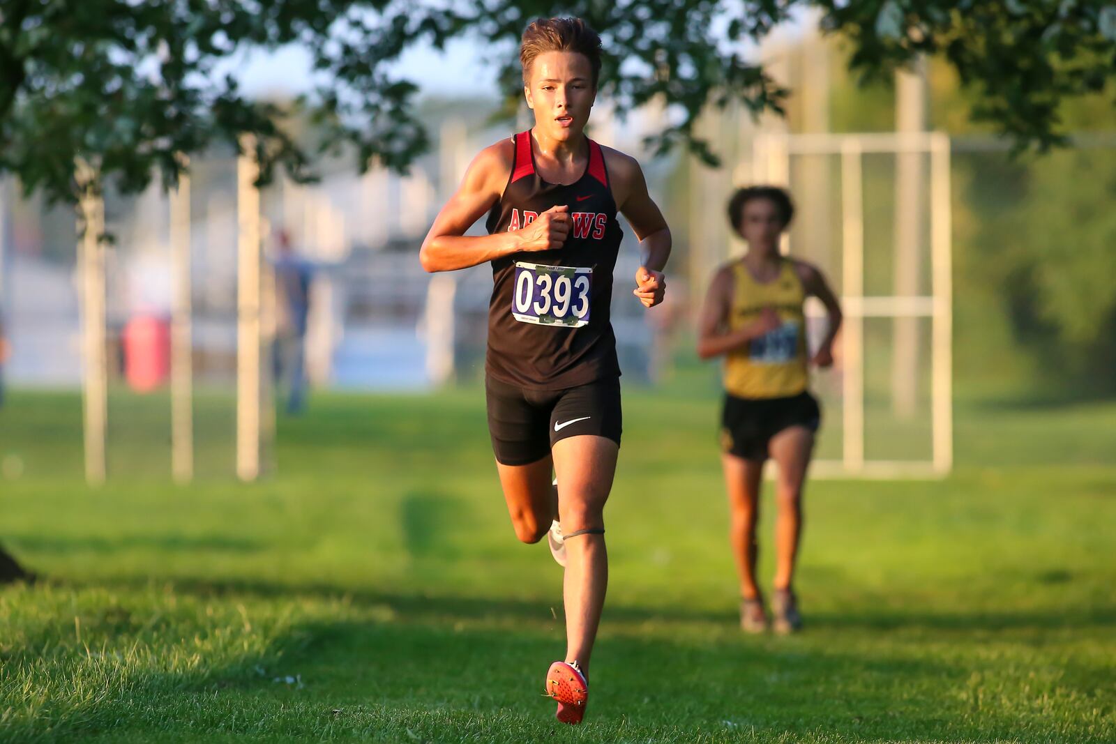 Cutline 2: Tecumseh High School senior Preston Jackson lead the pack during the Clark County cross country championship on Tuesday evening at Northwestern High School. Jackson won in a time of 17 minutes, 36 seconds. CONTRIBUTED PHOTO BY MICHAEL COOPER