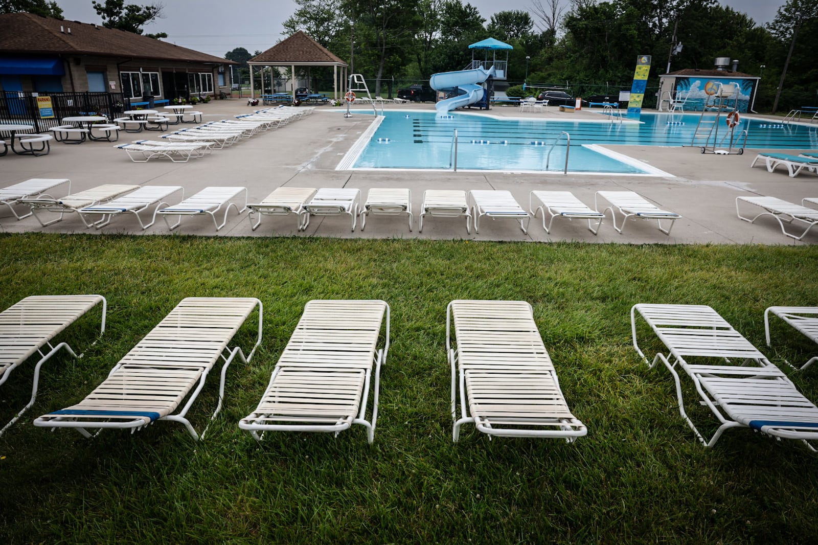 A chemical surge at the Dolphin Club swimming pool in Miami County led to multiple children taken to area hospitals as a precaution Monday, June 19, 2023. JIM NOELKER / STAFF