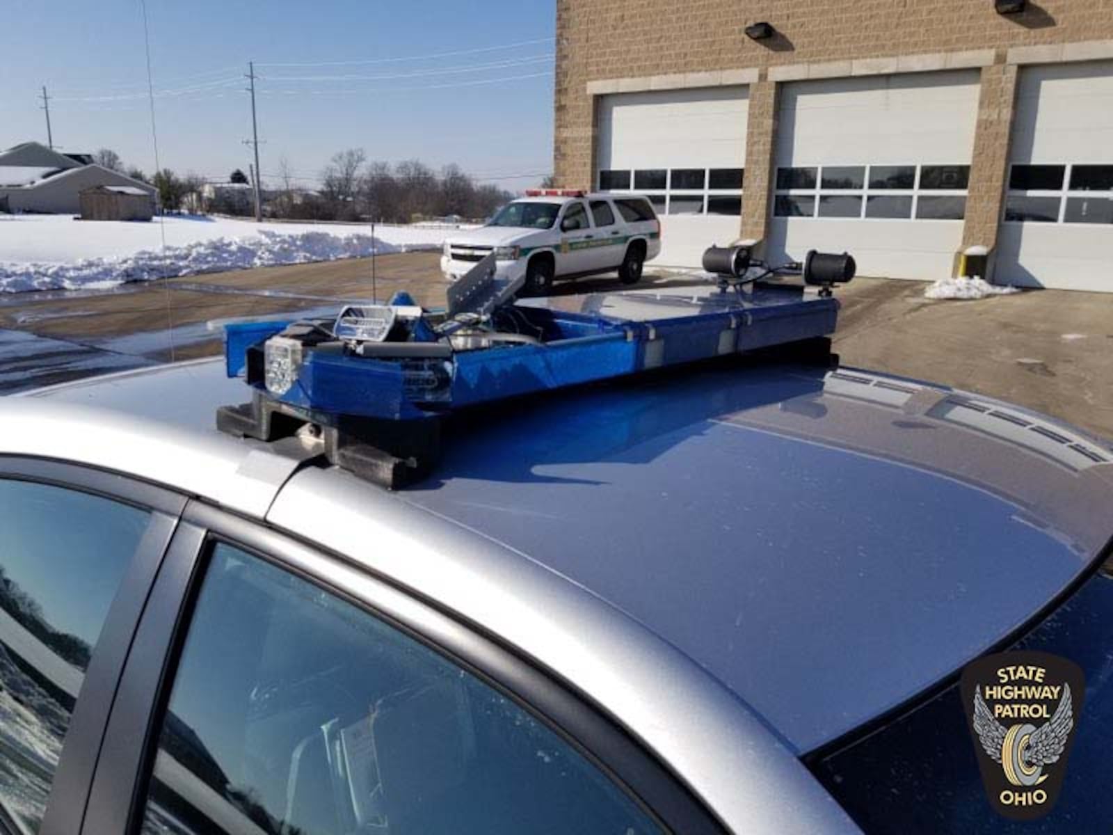 The light bar on an Ohio State Highway Patrol cruiser was damaged by ice flying off an SUV. Other OSHP vehicles have sustained windshield damage from flying ice. CONTRIBUTED PHOTO / OSHP