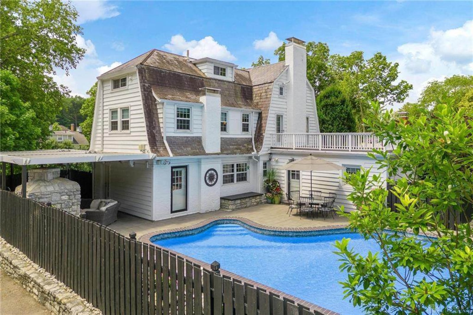 The swimming pool is surrounded by a concrete sun deck and was updated to a saltwater system with new equipment. Contributed