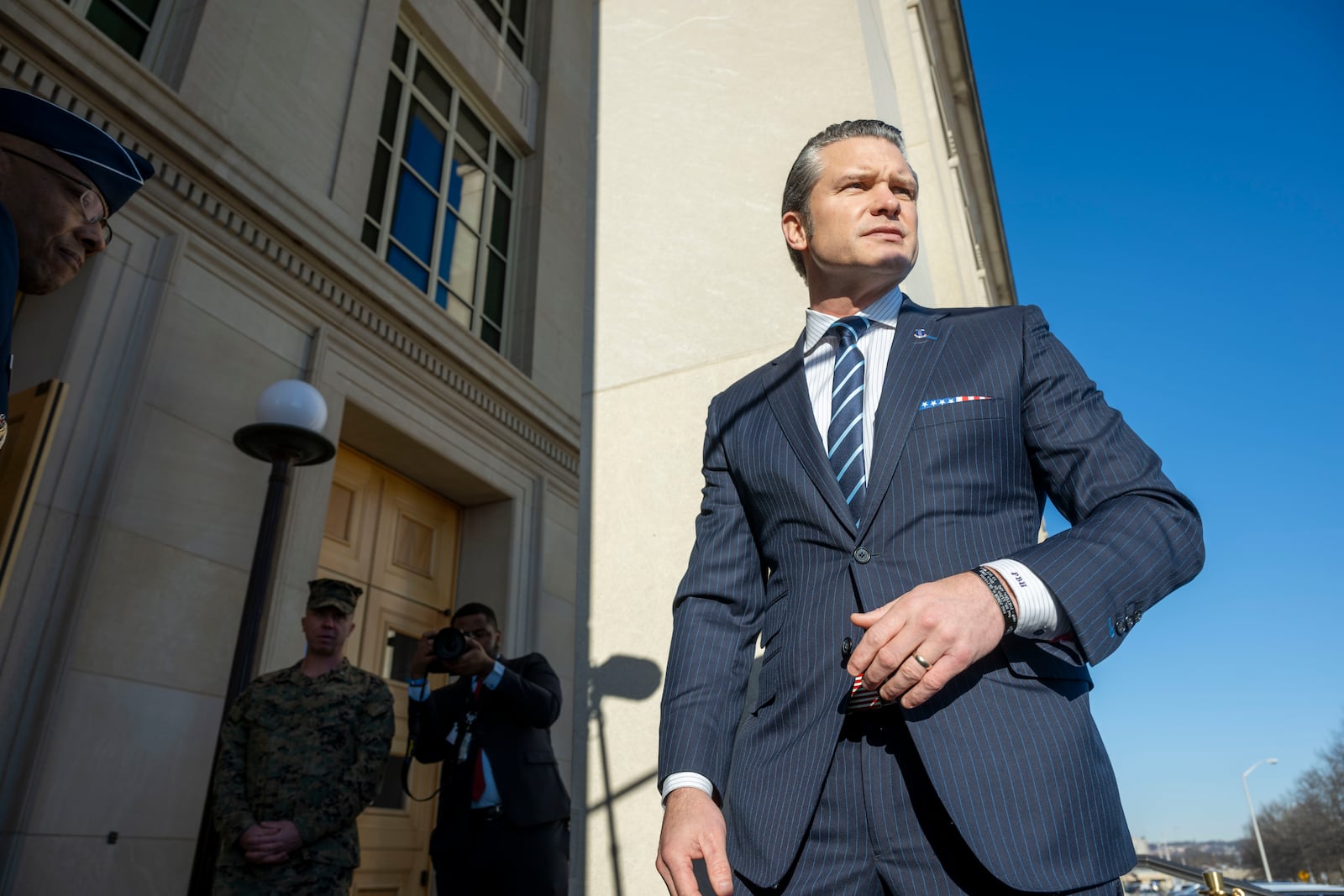 Defense Secretary Pete Hegseth arrives at the Pentagon, Monday, Jan. 27, 2025 in Washington. (AP Photo/Kevin Wolf)