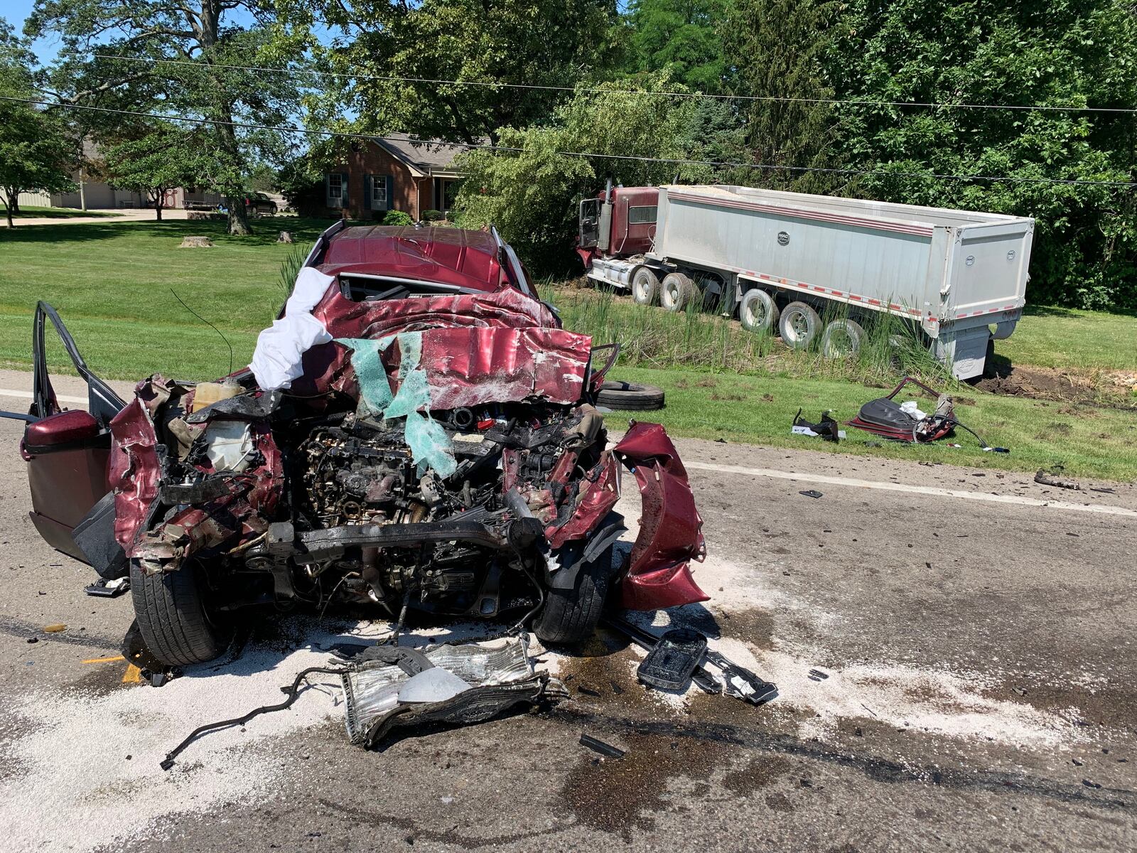 One person is dead and another suffered minor injuries after an SUV and semi truck crashed on state Route 41 in Clark County on Thursday. BILL LACKEY / STAFF