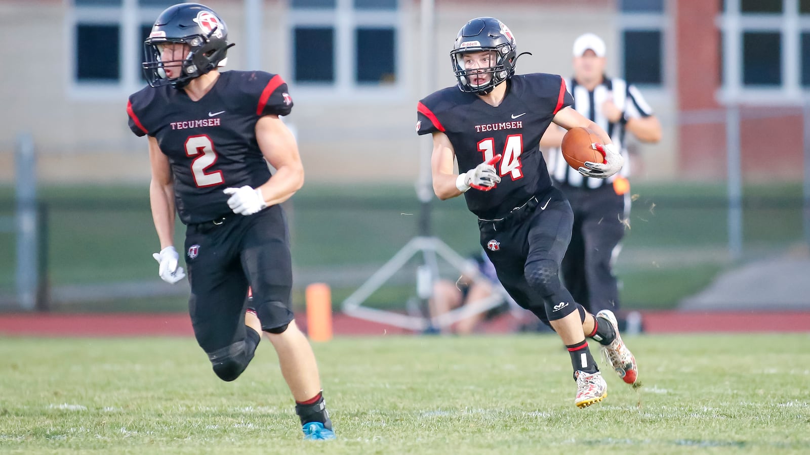 Tecumseh High School's Timmy Moore, Jr. returns a kickoff during their game against Carroll at Spitzer Stadium last season. CONTRIBUTED PHOTO BY MICHAEL COOPER