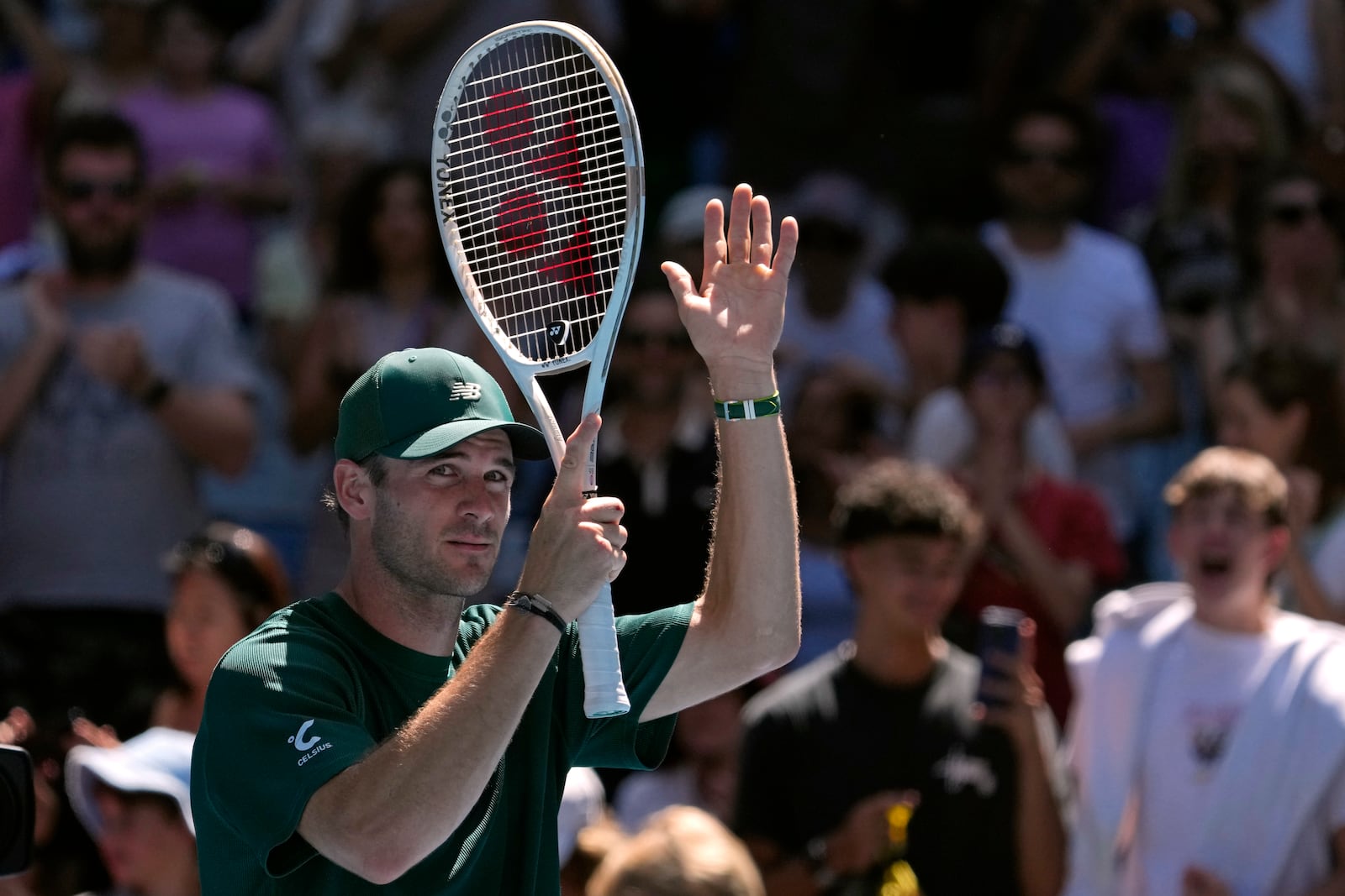 Tommy Paul of the U.S. celebrates after defeating Roberto Carballes Baena of Spain in their third round match at the Australian Open tennis championship in Melbourne, Australia, Friday, Jan. 17, 2025. (AP Photo/Manish Swarup)