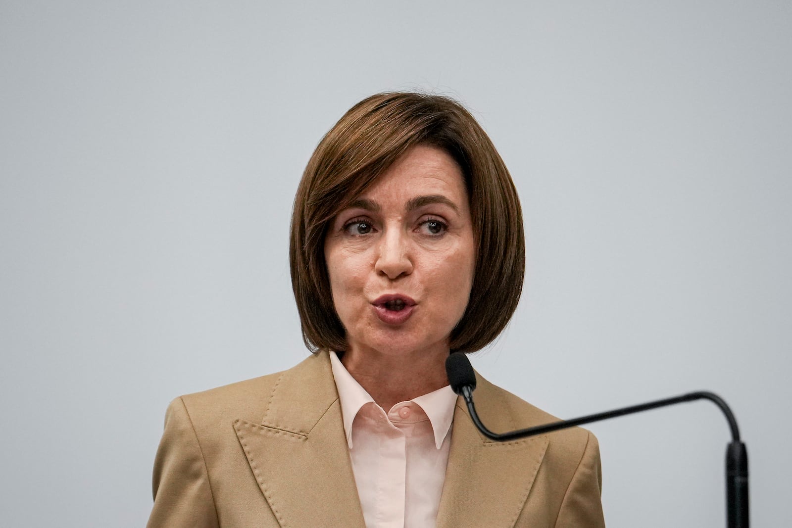 Moldova's President Maia Sandu speaks to the media during a press briefing after the polls closed for the presidential election and the referendum on whether to enshrine in the Constitution the country's path to European Union membership, in Chisinau, Moldova, early Monday, Oct. 21, 2024. (AP Photo/Vadim Ghirda)