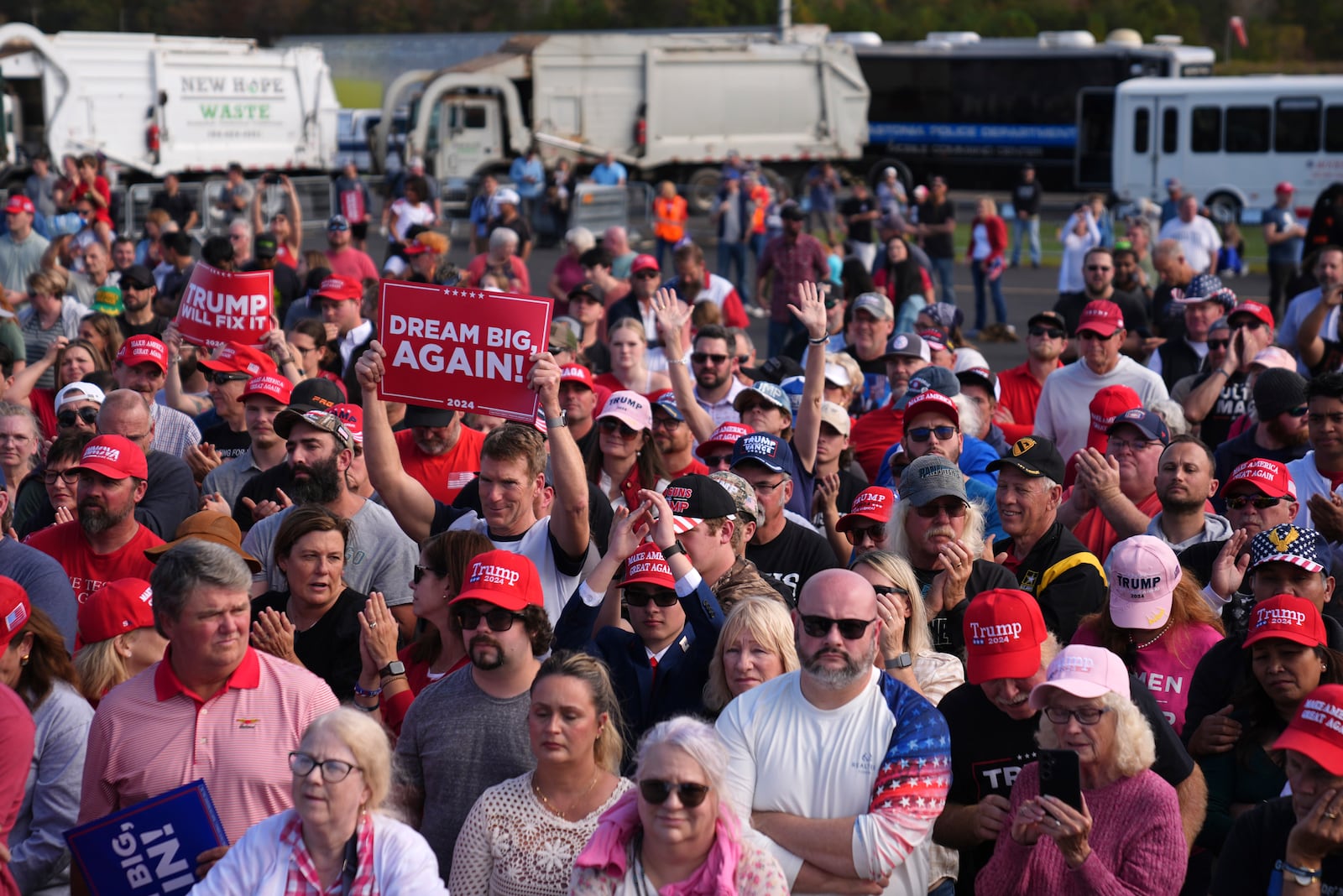 Supporters listen as Republican presidential nominee former President Donald Trump speaks at a campaign rally at Gastonia Municipal Airport, Saturday, Nov. 2, 2024, in Gastonia, N.C. (AP Photo/Evan Vucci)