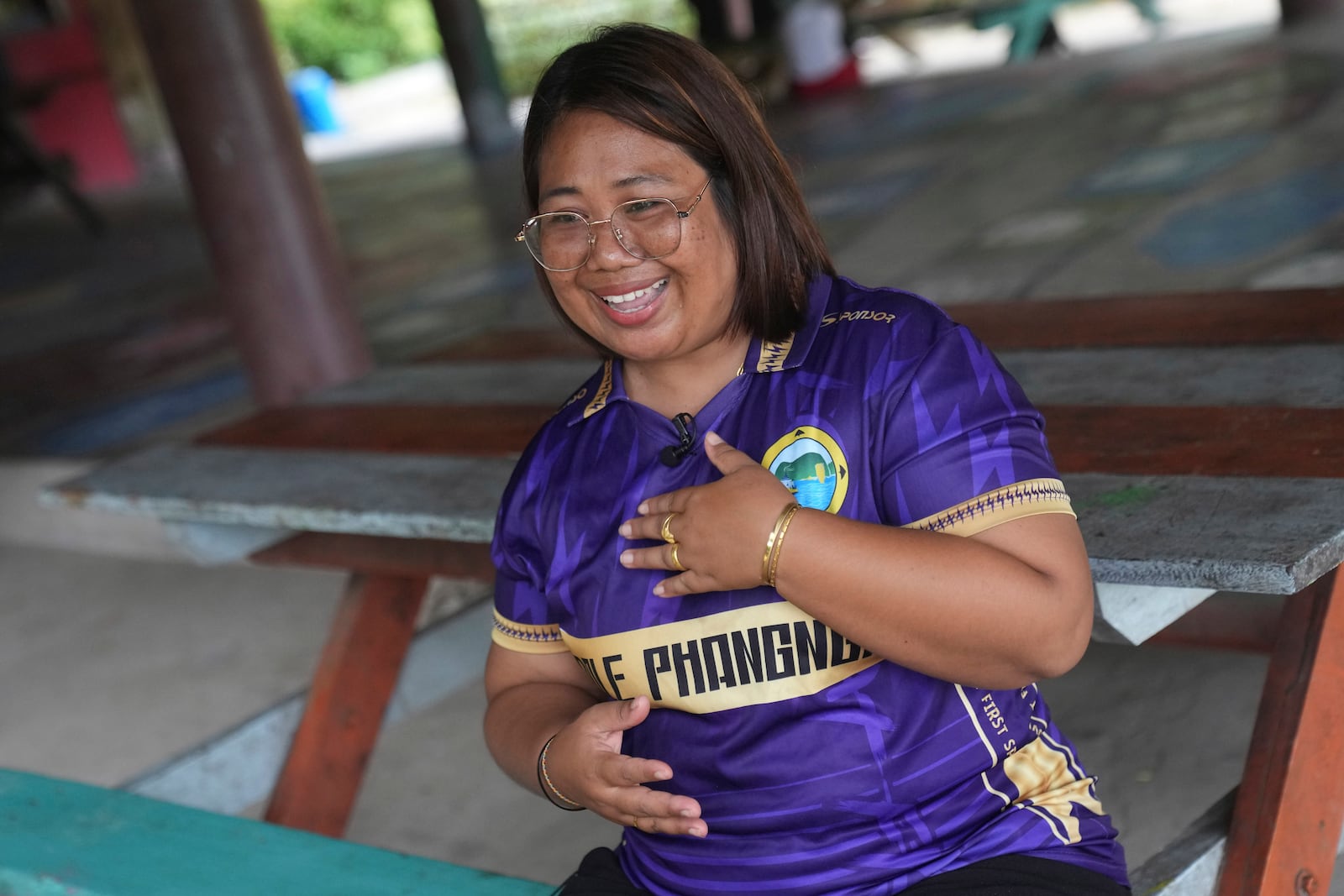 Wilasnee Klathale speaks to reporters during an interview with The Associated Press at Moken village at Surin Islandin Phang Nga Province, Thailand, Thursday, Dec. 12, 2024, (AP Photo/Sakchai Lalit)