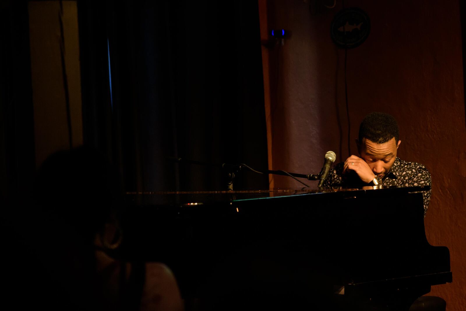 John Legend made a surprise visit to the Oregon District in Dayton on Sunday, Aug. 11, just one week after the mass shooting that killed nine and injured 27. Legend gave a private show at Blind Bob’s. TOM GILLIAM / CONTRIBUTING PHOTOGRAPHER