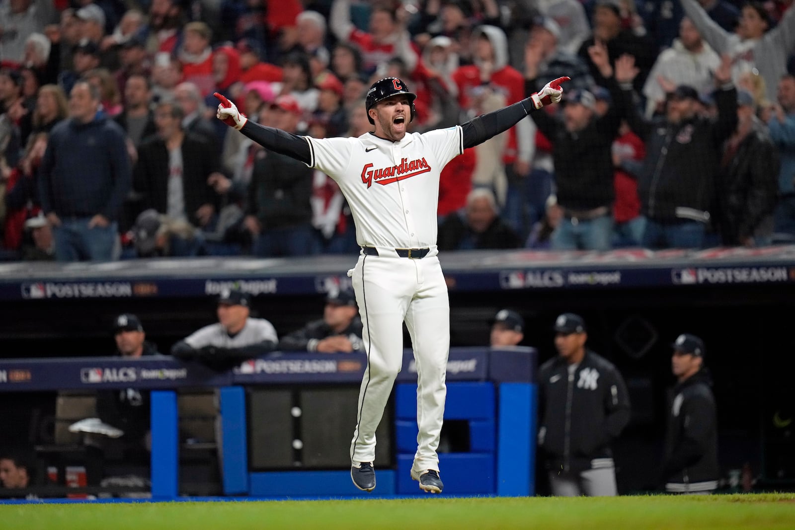 Cleveland Guardians' David Fry celebrates after hitting a game-winning two-run home run against the New York Yankees during the 10th inning in Game 3 of the baseball AL Championship Series Thursday, Oct. 17, 2024, in Cleveland. The Guardians won 7-5. (AP Photo/Jeff Roberson)