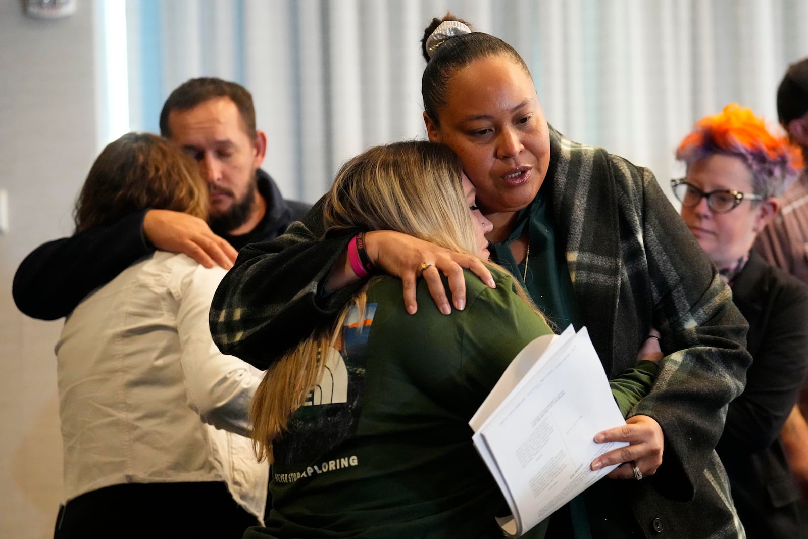 Adriana Vance, mother of Raymond Green, who was killed in the Club Q mass shooting in Colorado Springs, Colo., in 2022, talks about her son during a news conference announcing lawsuits filed against the sheriff's office and the nightclub's owners, Tuesday, Nov. 18, 2024, in Denver. (AP Photo/Jack Dempsey)