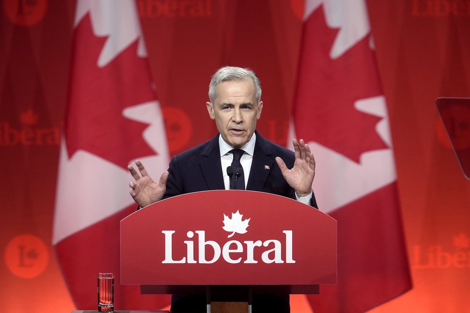 Liberal Party of Canada Leader Mark Carney speaks following the announcement of his win at the party's announcement event in Ottawa, Ontario, Sunday, March 9, 2025. (Adrian Wyld/The Canadian Press via AP)