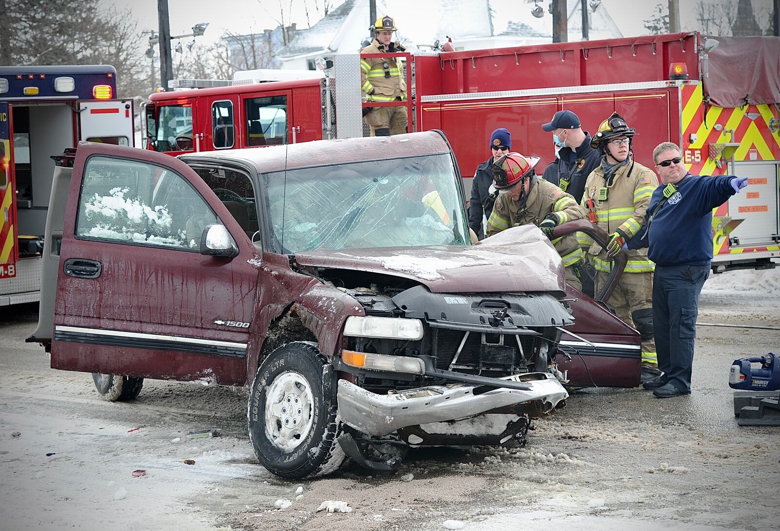 The driver of a pickup truck was trapped after crashing into a tree late Friday morning, Feb. 4, 2022, on Columbia Street in Springfield. MARSHALL GORBY/STAFF