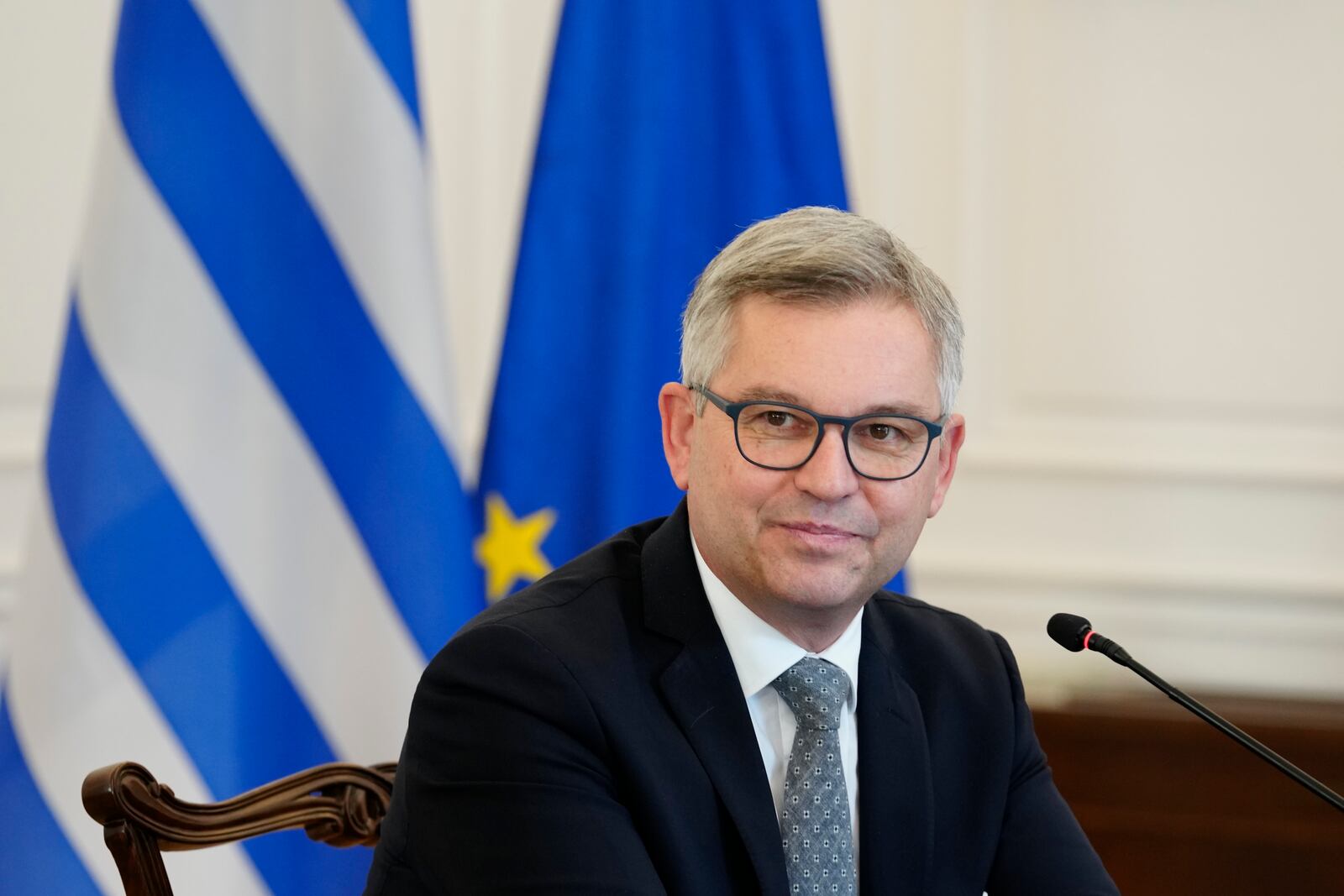 The European Union's new commissioner for migration, Magnus Brunner attends a meeting with Greece's Prime Minister Kyriakos Mitsotakis in Athens, Thursday, Jan. 16, 2025. (AP Photo/Petros Giannakouris)