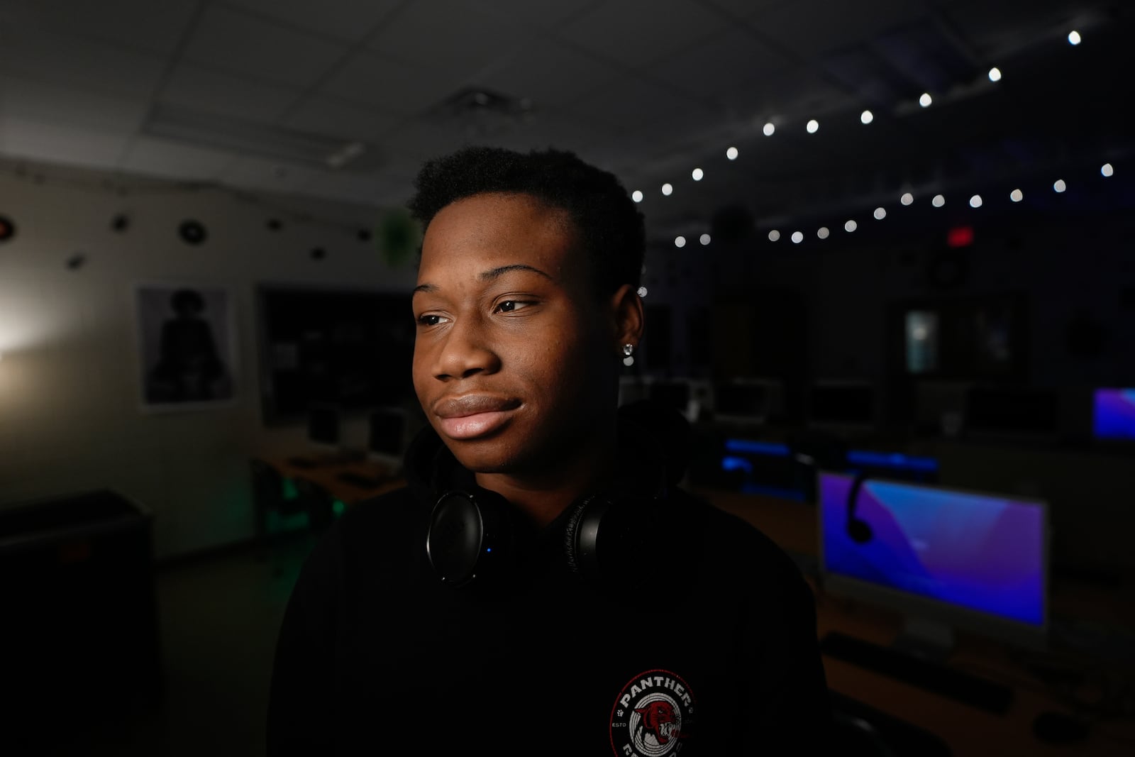 D. M. Therrell High School student Ja'Marion Hulin, 17, who runs the school's record company, Panther Records, poses for a photograph Monday, Jan. 27, 2025, in Atlanta. (AP Photo/Brynn Anderson)