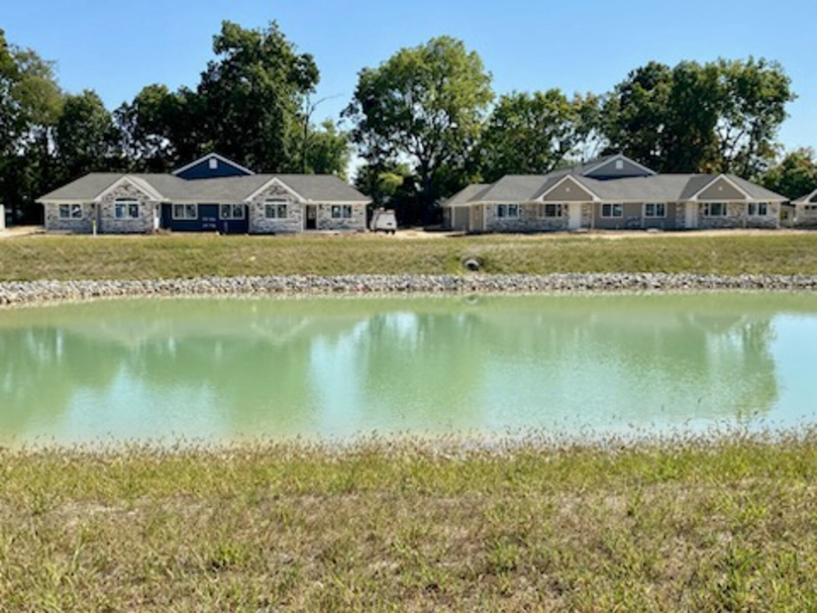 Olympic Reserve, a new condominium development on Springfield’s north side, is completing the first section of construction for sale. The 44 new units will surround a pond centered in the middle of the development. The developer is Mid-Ohio Development Corporation in the Columbus area. Ben McLaughlin/Staff