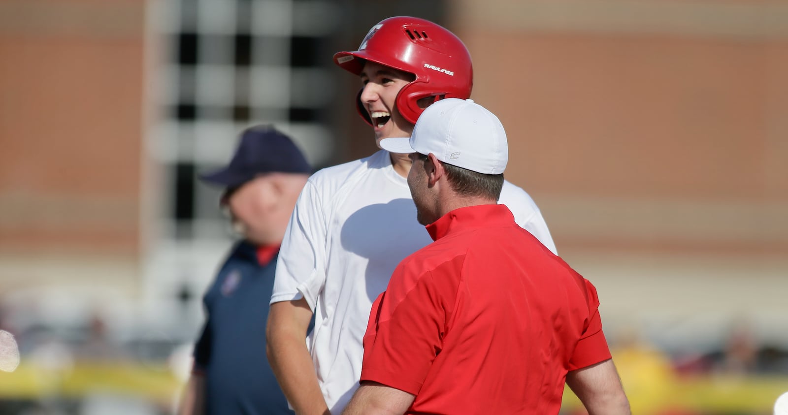 Tippecanoe's Matthew Salmon reacts after driving in two runs with a triple in the third inning against Kenton Ridge in a Division II district semifinals on Tuesday, May 24, 2022, at Tecumseh High School in New Carlisle. David Jablonski/Staff