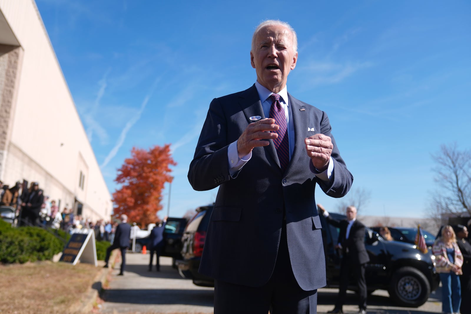 President Joe Biden speaks with reporters after casting his early-voting ballot for the 2024 general elections, Monday, Oct. 28, 2024, at a polling station in New Castle, Del. (AP Photo/Manuel Balce Ceneta)