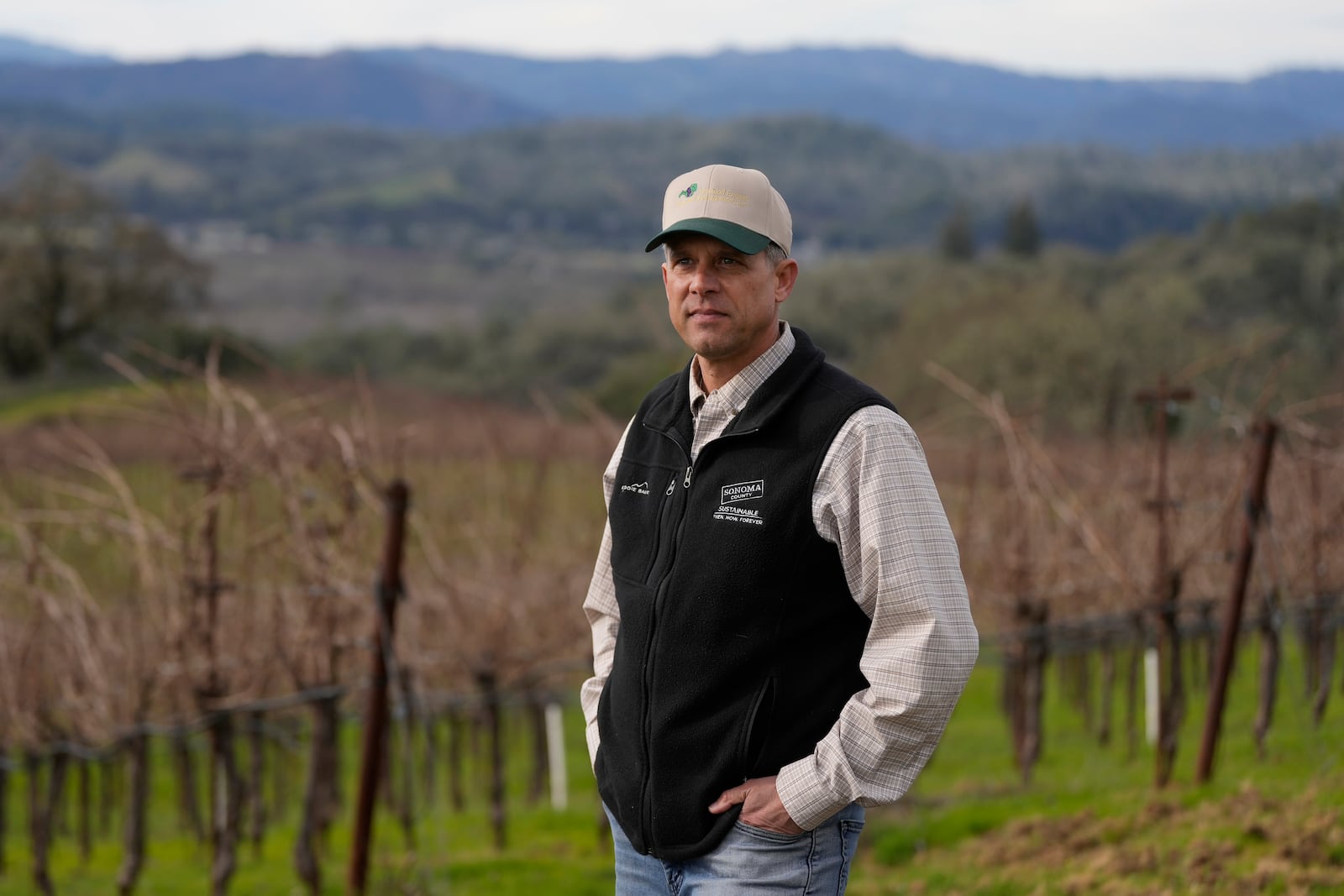 Tyler Klick, Partner/Viticulturist of Redwood Empire Vineyard Management, poses for photos while during an interview on AI technology being used in the wine industry in Geyserville, Calif., Friday, Jan. 24, 2025. (AP Photo/Jeff Chiu)