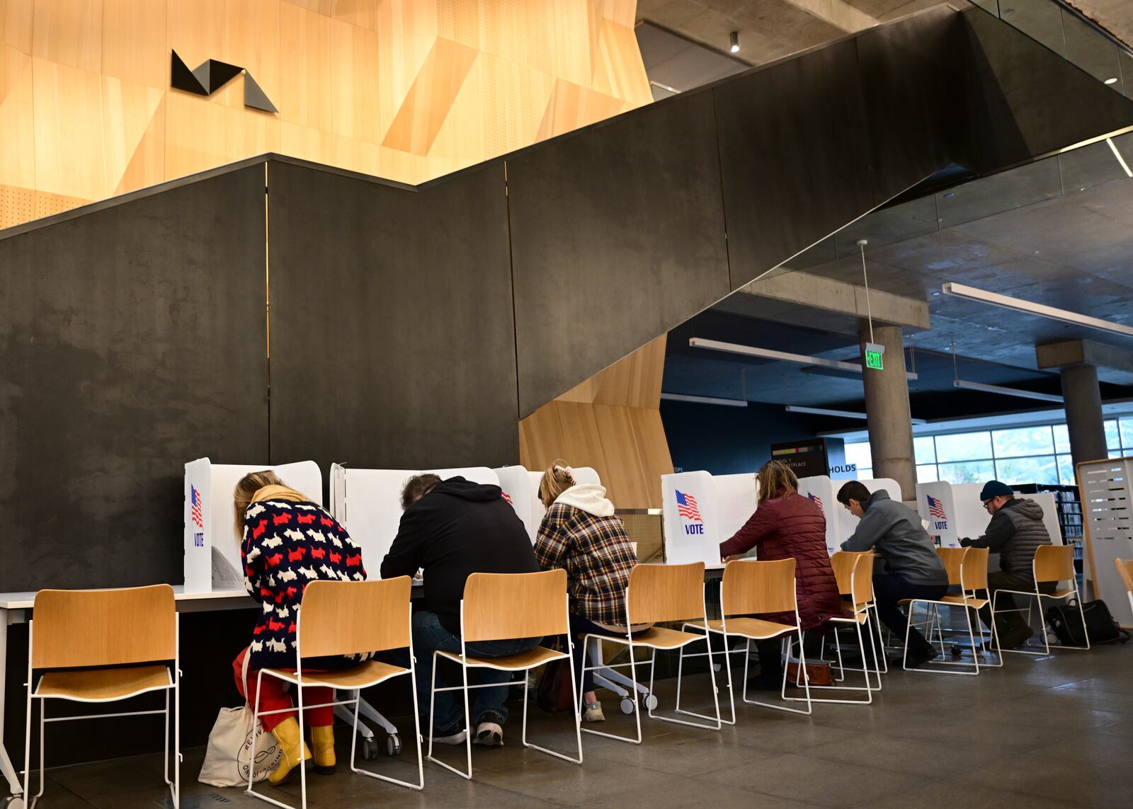 Missoulians vote at the Missoula Public Library in Missoula, Mont., on Election Day, Tuesday, Nov. 5, 2024. (AP Photo/Tommy Martino)