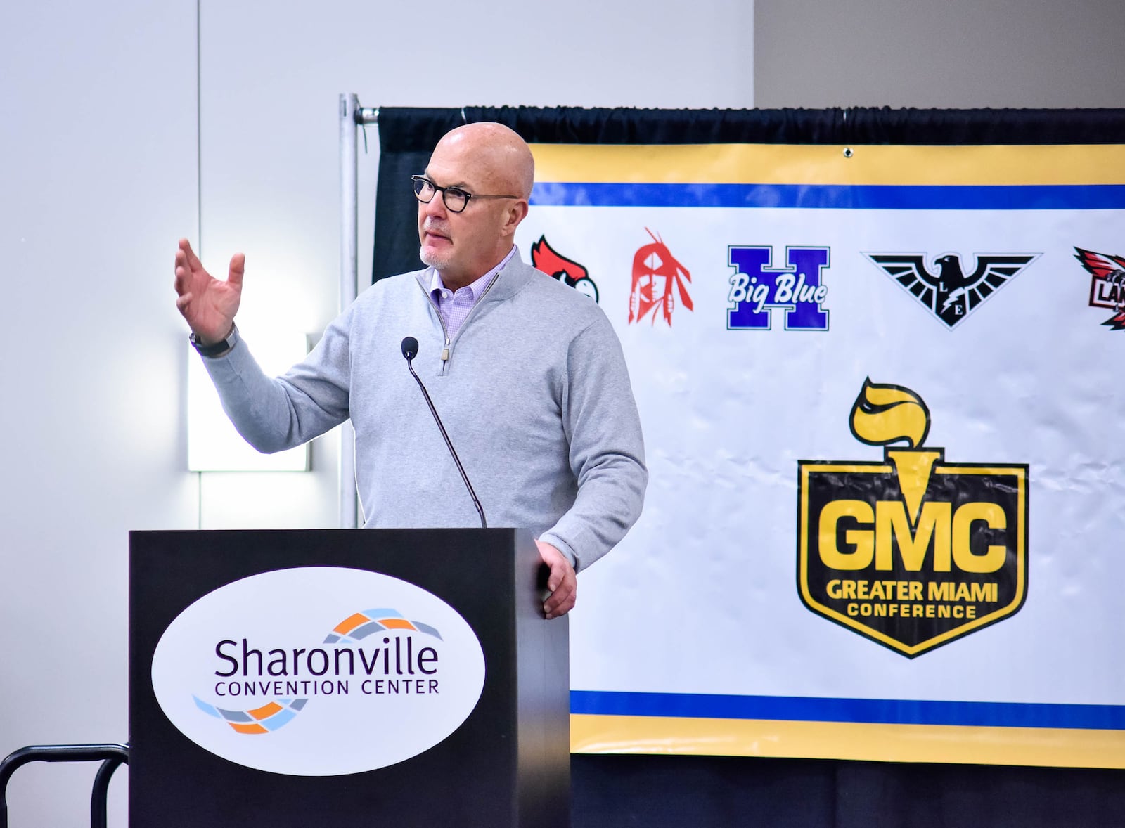 Dr. Timothy Kremchek with Beacon Orthopaedics & Sports Medicine speaks during the Greater Miami Conference football signing day program Wednesday, Feb. 5 at Sharonville Convention Center. Over fifty students from the ten schools in the leauge have signed letters of intent to play football in college. NICK GRAHAM / STAFF