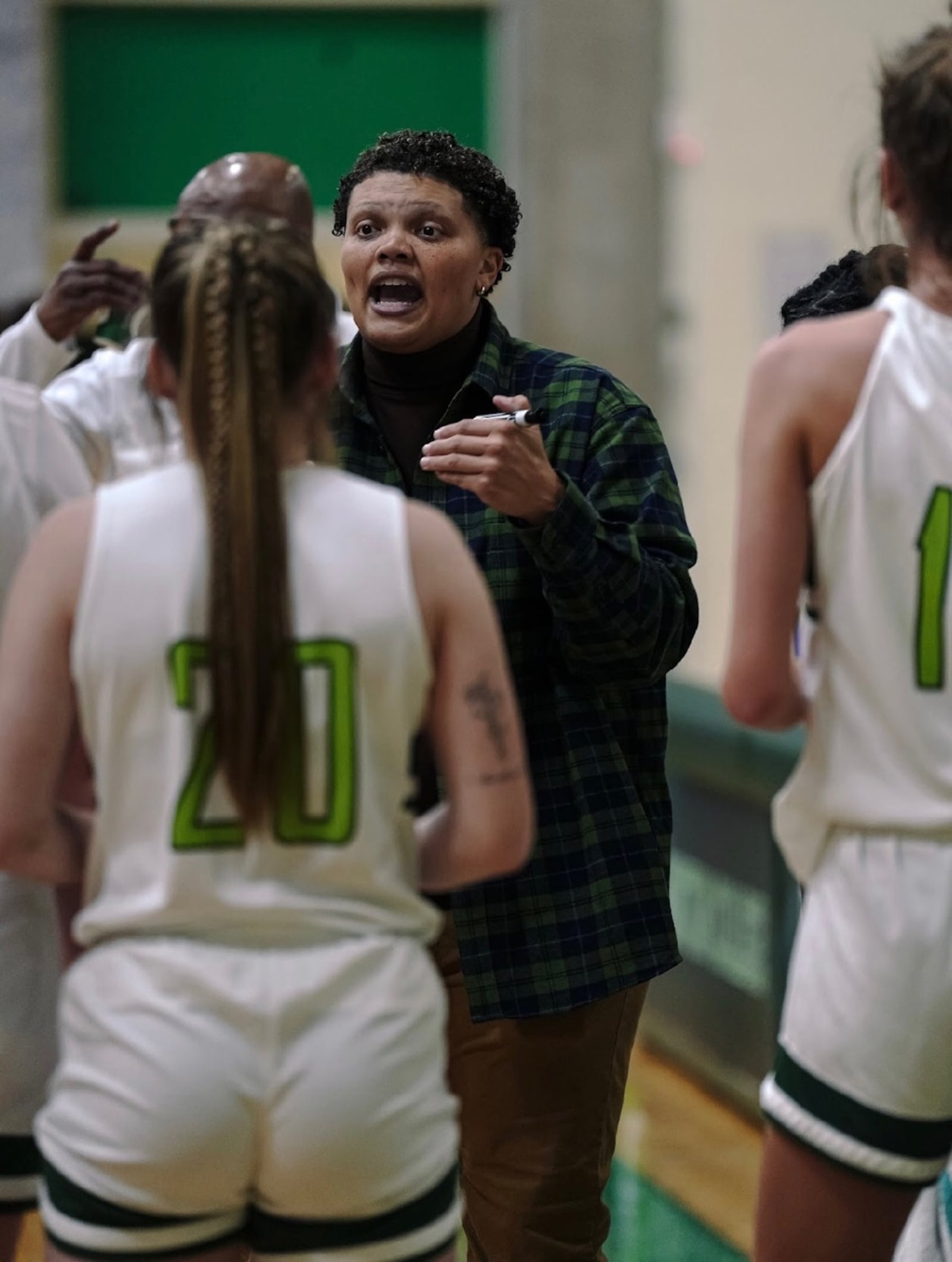 Wilmington College women's basketball coach Sydney Moss talks to her team during a recent game. Wilmington College Athletics photo