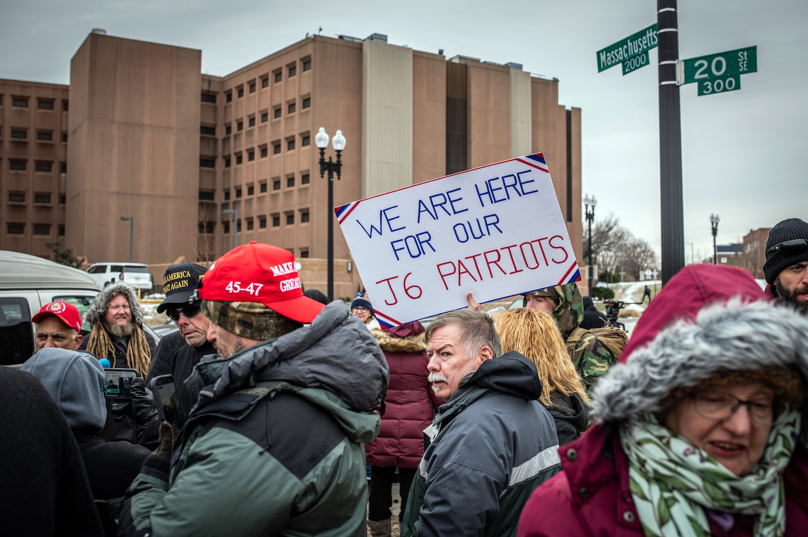 
                        Supporters gather on Tuesday, Jan. 21, 2025, outside the District of Columbia Detention Facility, the local jail in Washington, as they await the release of people charged in connection with the attack on the Capitol on Jan. 6, 2021. One day after President Donald Trump issued a sweeping legal reprieve to all of the nearly 1,600 people charged in the Capitol attack, some of the defendants started having their cases dismissed or even began to be released from custody. (Graham Dickie/The New York Times)
                      