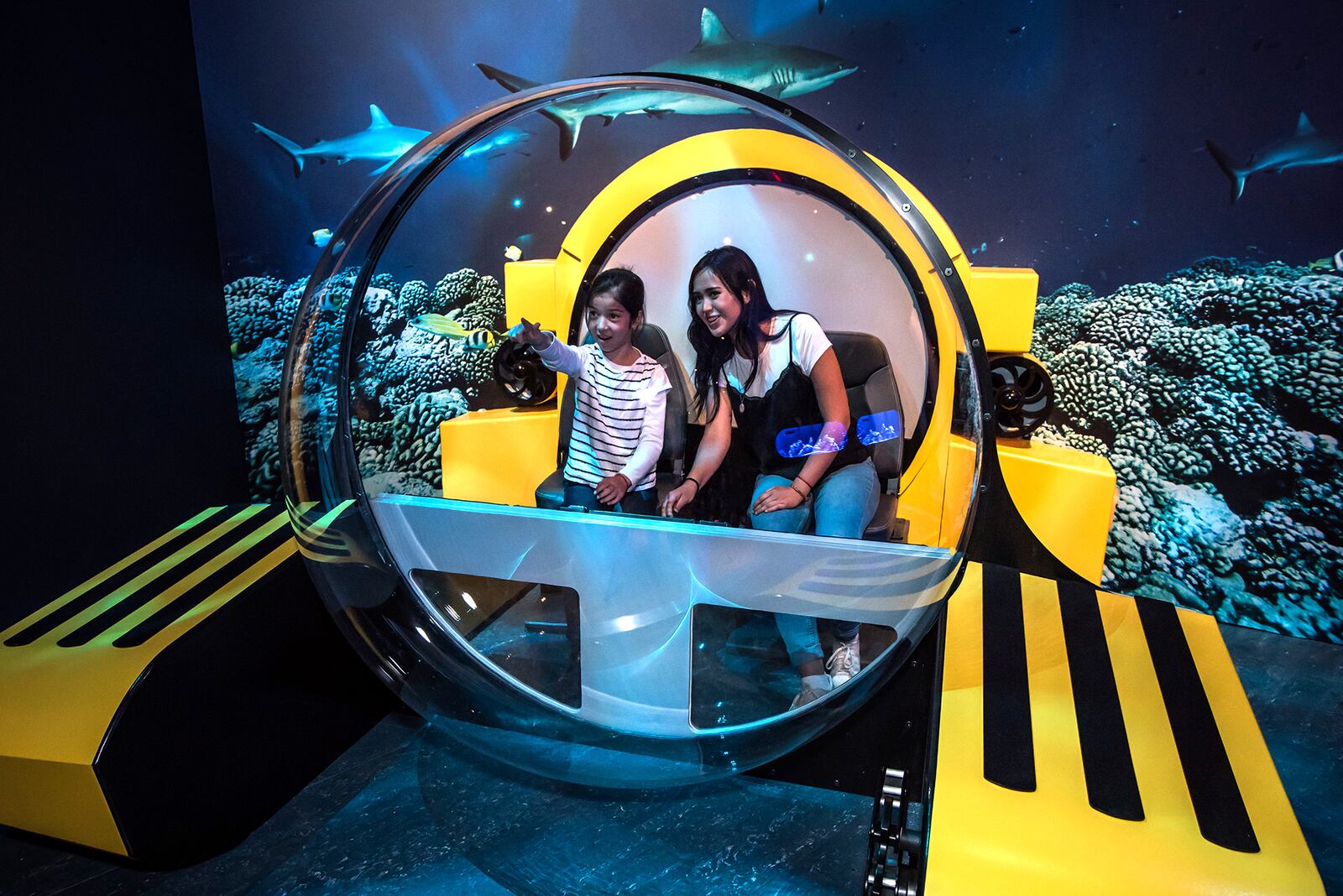 A partial replica of a Triton submersible provides a great photo opportunity for "Unseen Oceans" visitors who have cameras at the ready.  Â©AMNH/D. Finnin