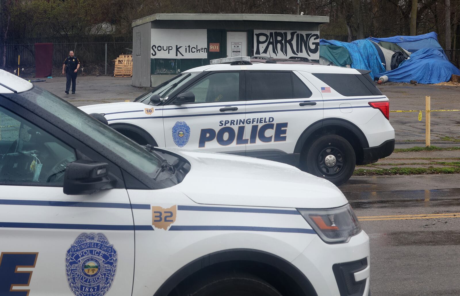 Springfield police investigate a homicide at a homeless encampment at 901 West Main Street Wednesday, April 6, 2022. BILL LACKEY/STAFF