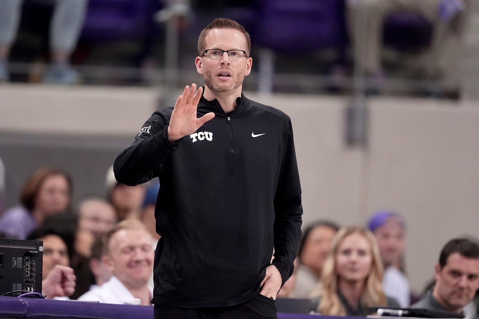 TCU head coach Mark Campbell instructs his team in the second half of an NCAA college basketball game against Houston in Fort Worth, Texas, Wednesday, Feb. 26, 2025. (AP Photo/Tony Gutierrez)