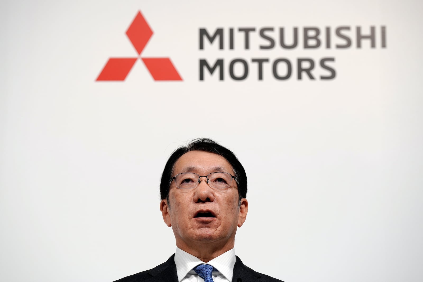 Takao Kato CEO of Mitsubishi Motors speaks during a joint news conference with Nissan and Honda representatives in Tokyo, Japan, Monday, Dec. 23, 2024. (AP Photo/Eugene Hoshiko)