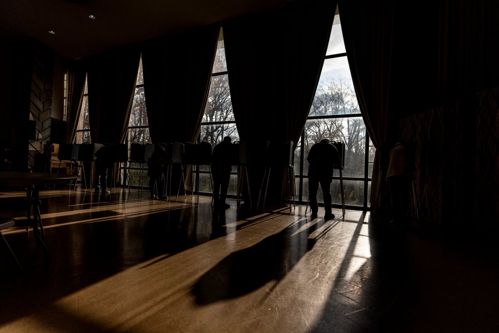 Voters fill out their ballots at a polling site at the First Presbyterian Church of Dearborn, on Election Day, Tuesday, Nov. 5, 2024, in Dearborn, Mich. (AP Photo/David Goldman)