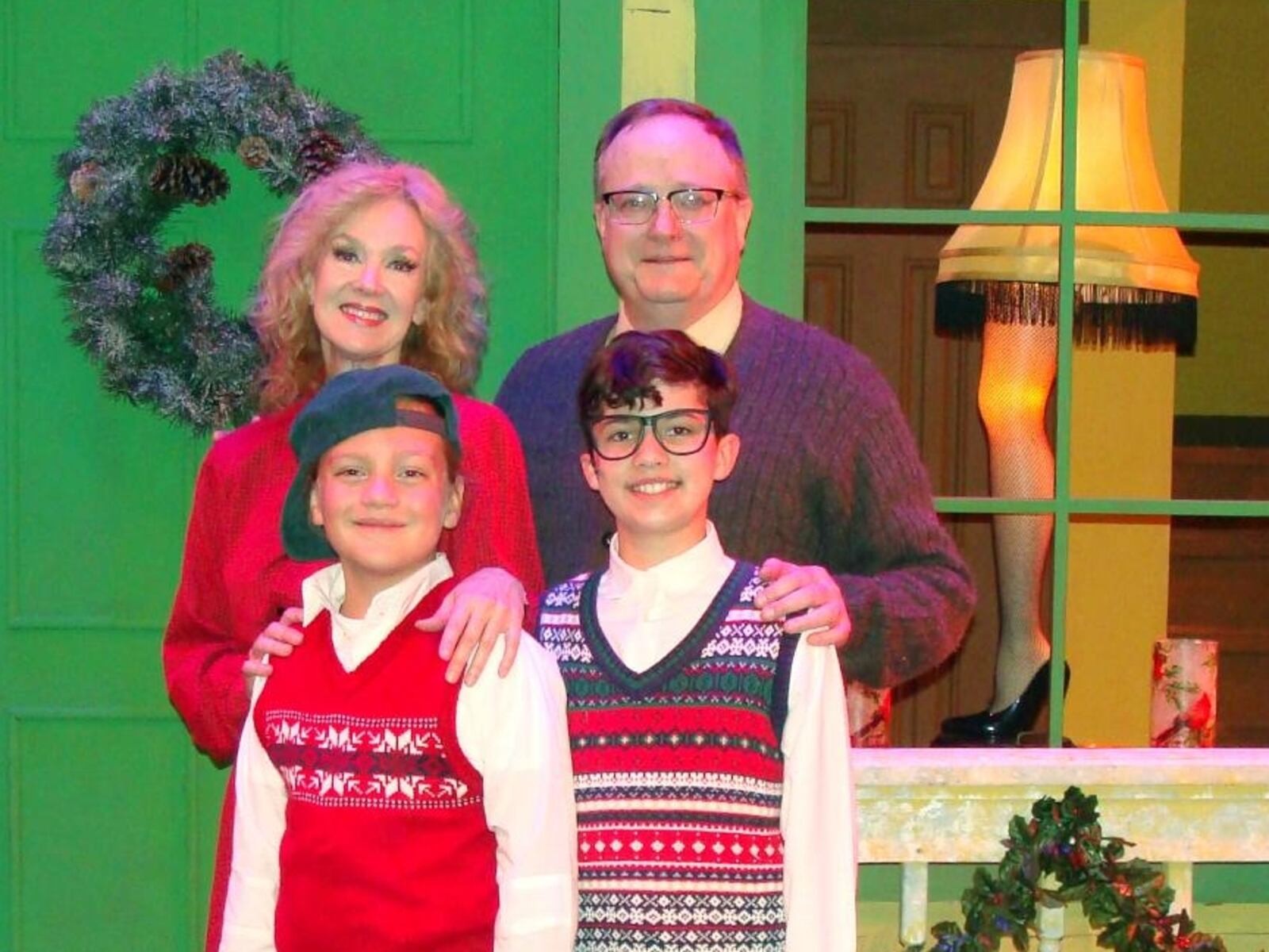 (clockwise) John Dorney (The Old Man), Sam Kingrey (Ralphie), Jax Heritage (Randy) and Karie-Lee Sutherland (Mother) in La Comedia Dinner Theatre's production of "A Christmas Story."