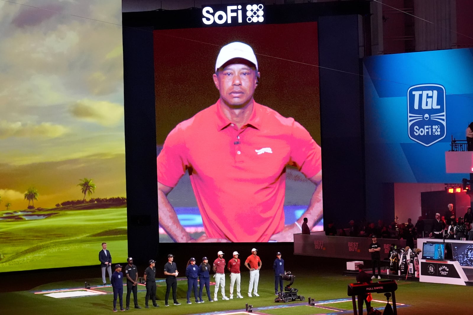 Tiger Woods is introduced before the start of Los Angeles Golf Club and his Jupiter Links Golf Club, Tuesday, Jan. 14, 2025, in Palm Beach Gardens, Fla. (AP Photo/Marta Lavandier)