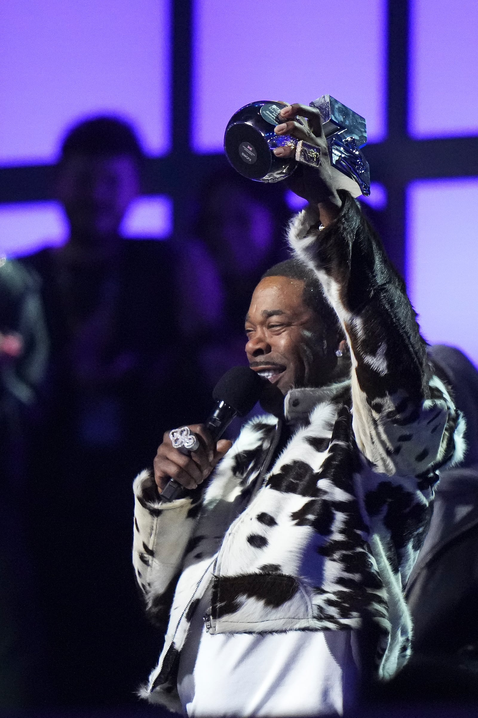 Busta Rhymes holds the 2024 MTV EMAs global icon award during the MTV European Music Awards in Manchester, England, Sunday, Nov. 10, 2024. (Scott A Garfitt/Invision/AP)