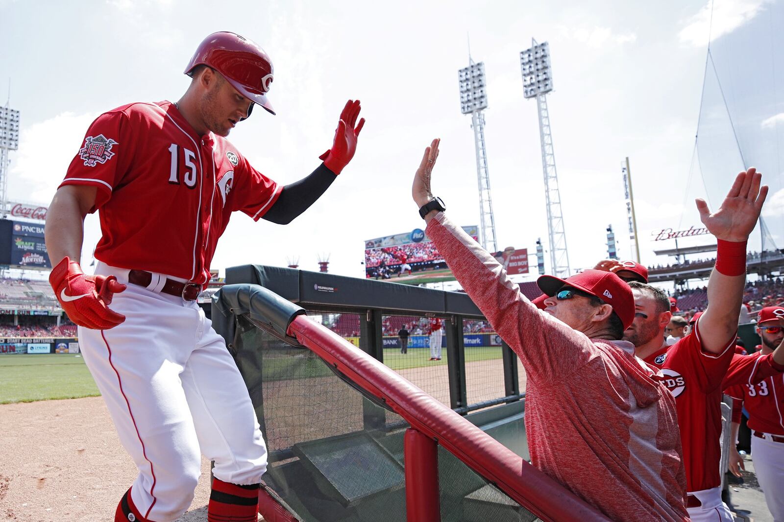 CINCINNATI, OH - MAY 06: Nick Senzel #15 of the Cincinnati Reds is greeted by manager David Bell after hitting a solo home run in the first inning against the San Francisco Giants at Great American Ball Park on May 6, 2019 in Cincinnati, Ohio. (Photo by Joe Robbins/Getty Images)