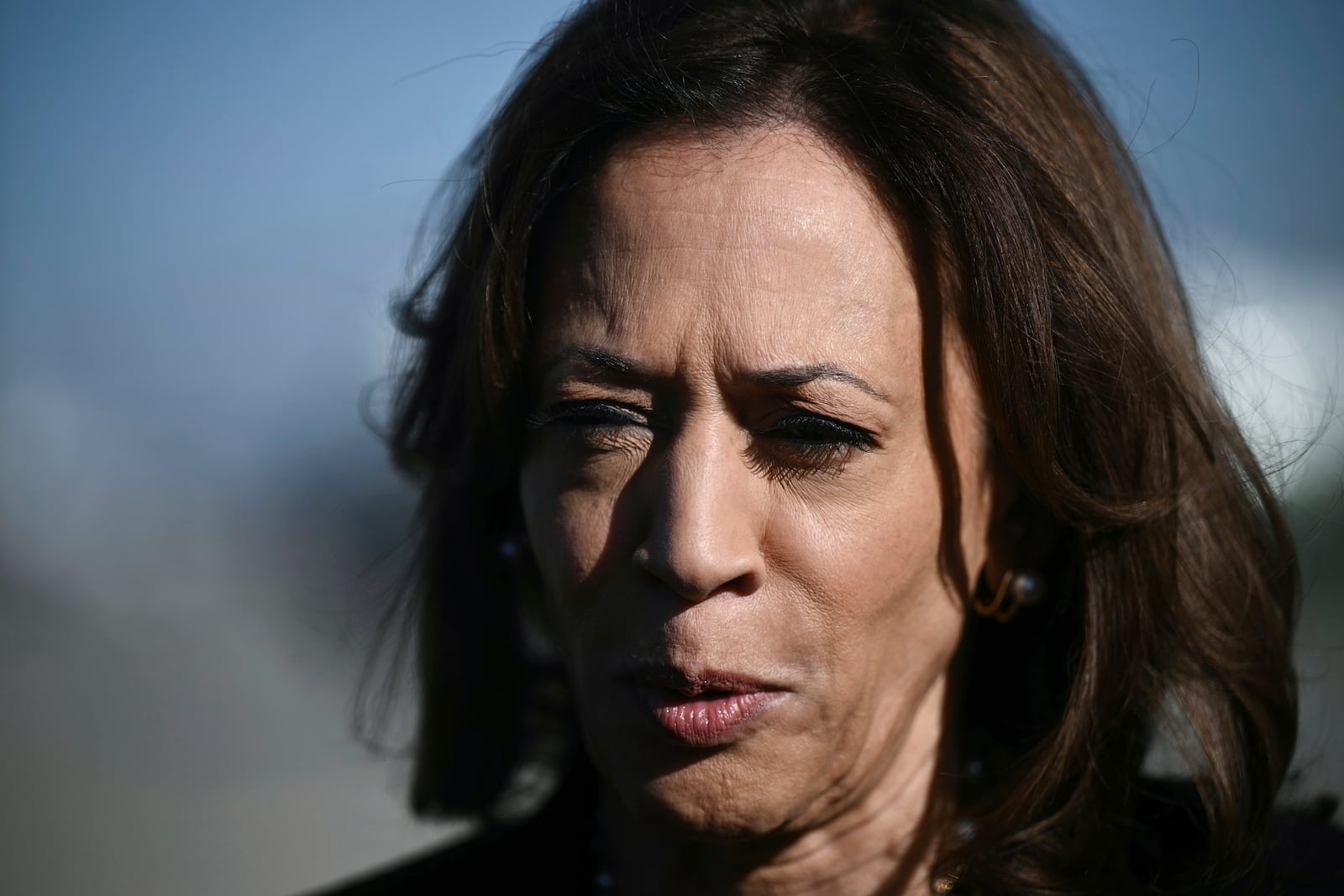 Democratic presidential nominee Vice President Kamala Harris talks to reporters before boarding Air Force Two, Wednesday, Oct. 30, 2024, at Joint Base Andrews, Md. (Brendan Smialowski/Pool via AP)