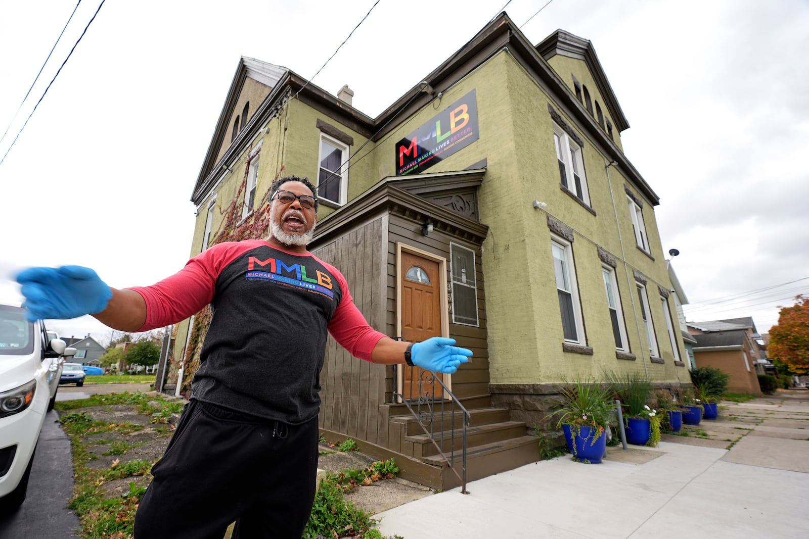 Small business owner Michael Hooks stands outside his building that houses his catering business in Erie, Pa. Friday, Nov. 1, 2024. (AP Photo/Gene J. Puskar)