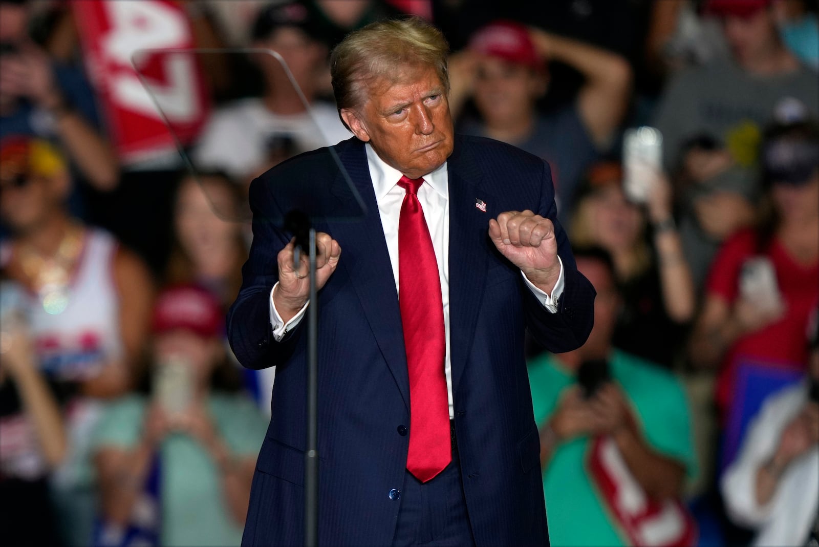 Republican presidential nominee former President Donald Trump dances at a campaign rally at Greensboro Coliseum, Tuesday, Oct. 22, 2024, in Greensboro, N.C. (AP Photo/Julia Demaree Nikhinson)