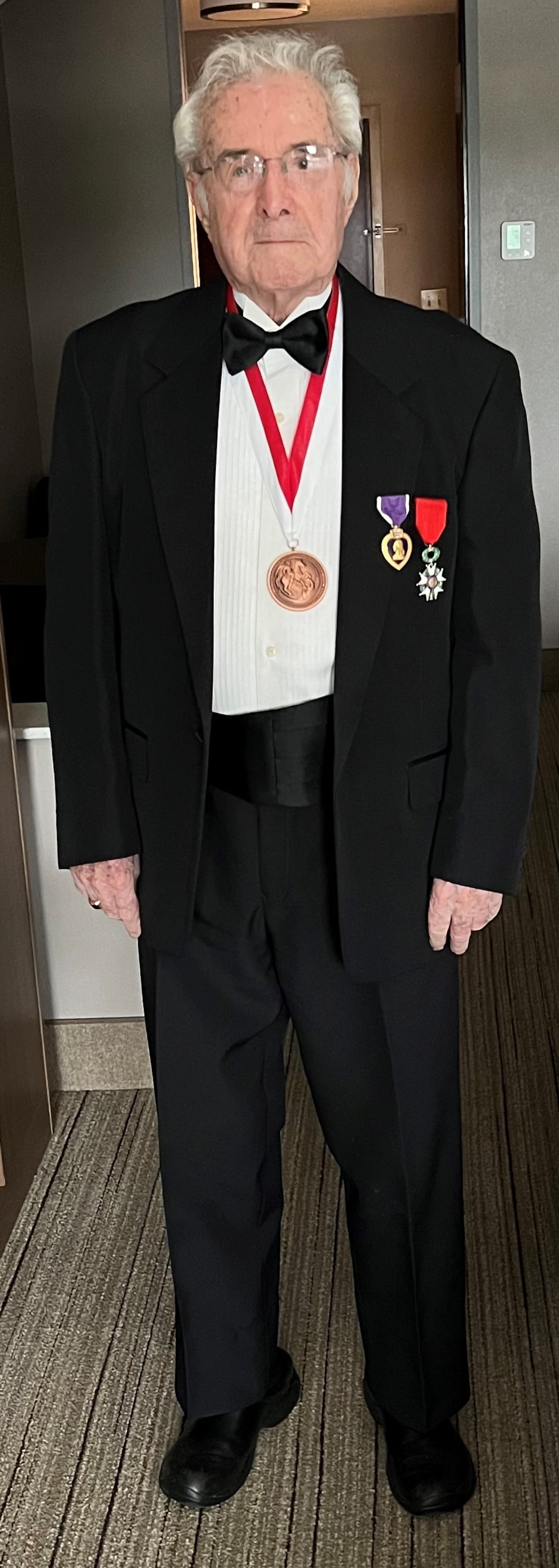 Walter Stitt wearing many of his medals for a recent ceremony. On his breast pocket is the purple Heart and French Legion Award and around his neck is the medal representing The Order of St. George. CONTRIBUTED